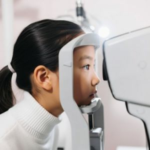Patient receiving vision screening.